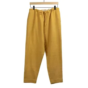 Drawstring tapered trousers in mango yellow cotton basketweave