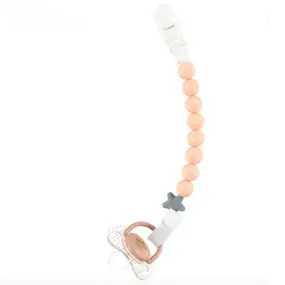 Nibbling Pluto Dummy Clip in Peach