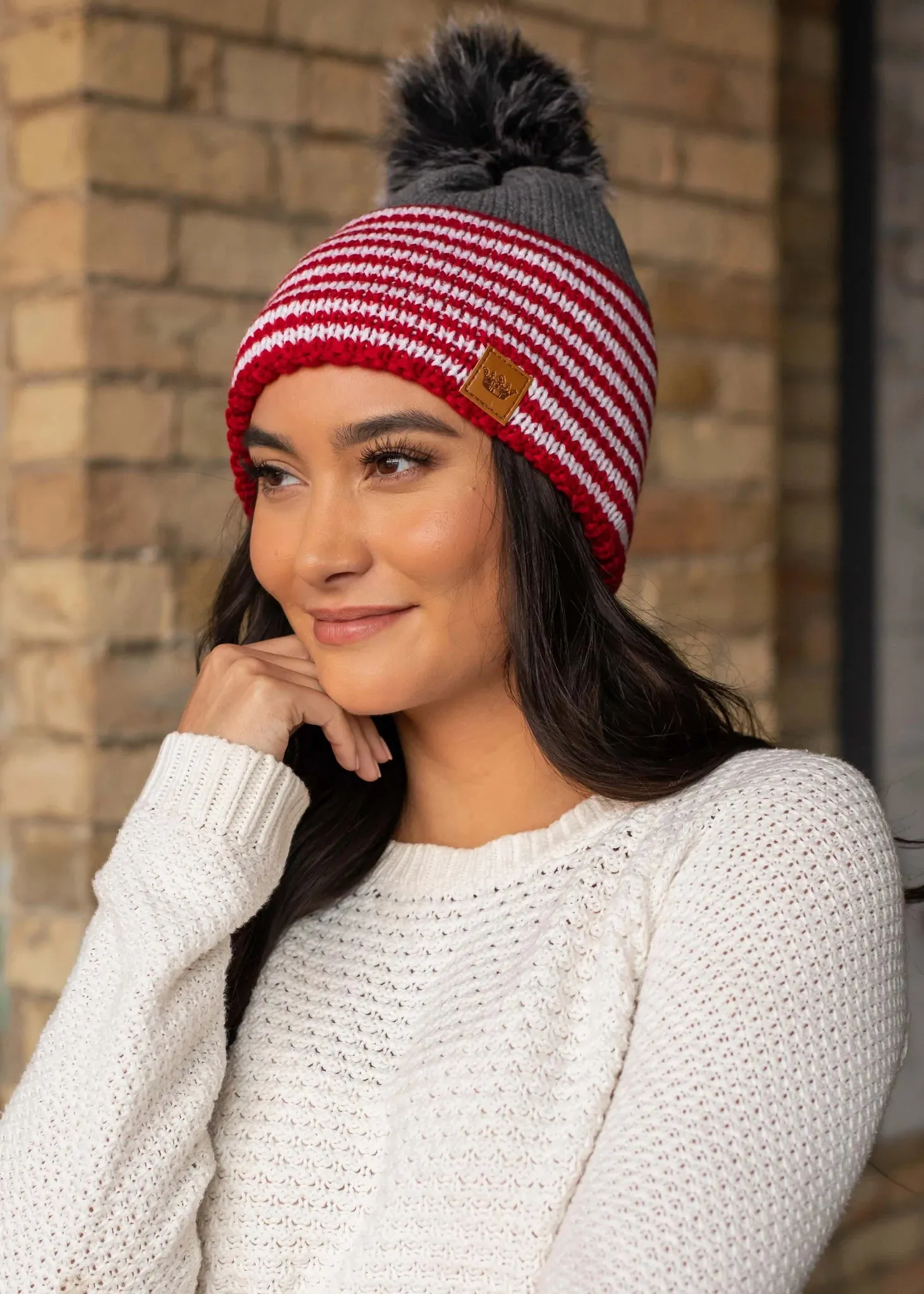 STRIPED KNIT FAUX FUR BEANIE