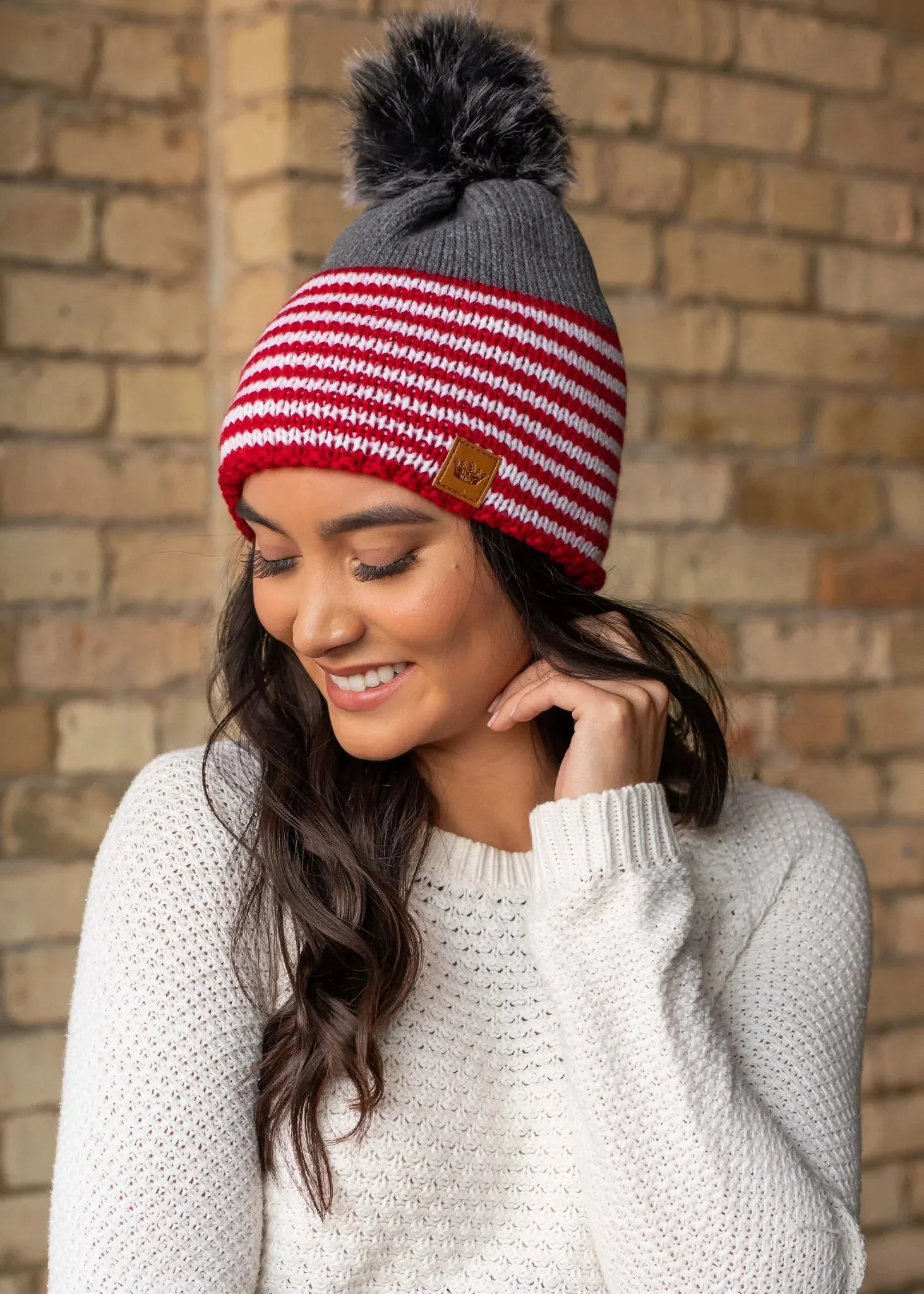 STRIPED KNIT FAUX FUR BEANIE